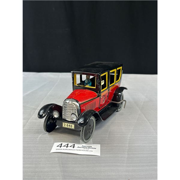 Newer 8" L Wind Up Taxi Tin Toy