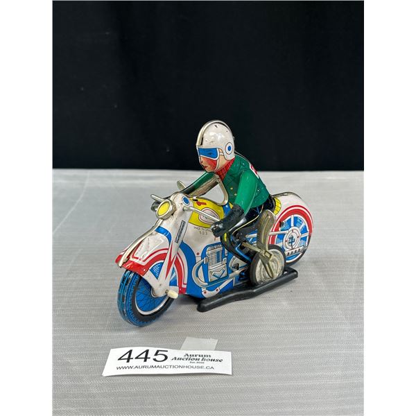 Wind Up Motorcycle and Rider Tin Toy