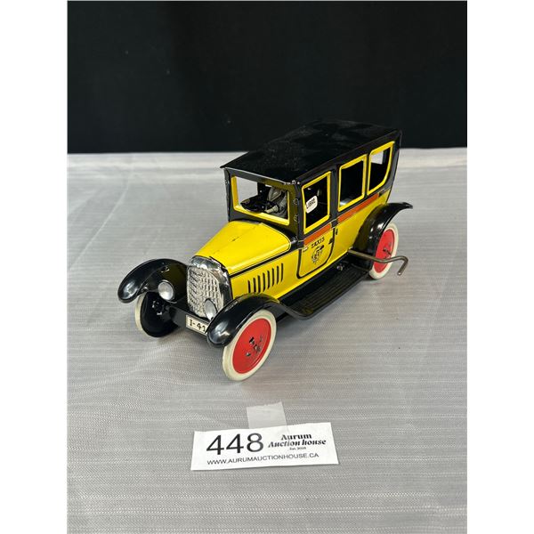 Newer 8" L Wind Up Taxi Tin Toy