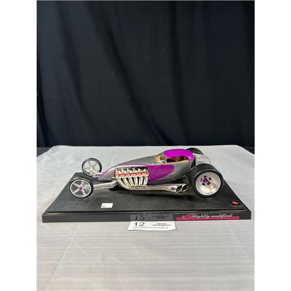 Hotwheels Slightly Modified Diecast Car on Stand