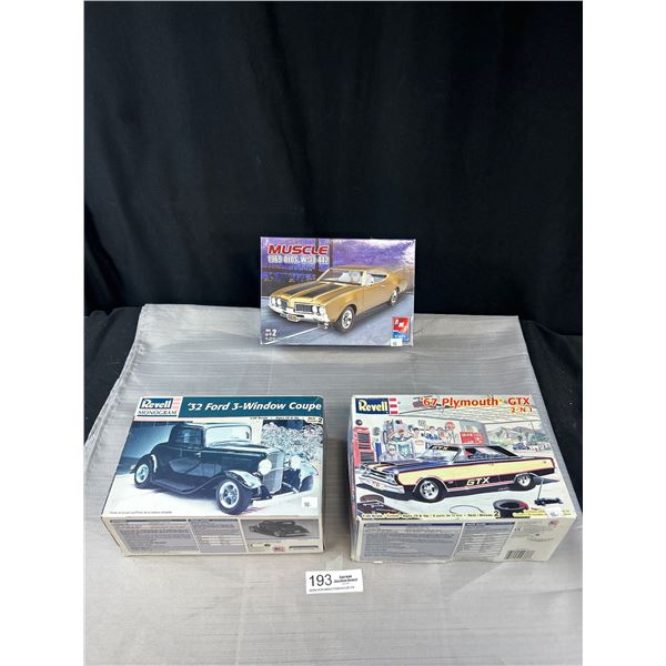 3 Vintage Model Kits Open but Complete, 67 Plymouth, 69 Olds and 32 Ford