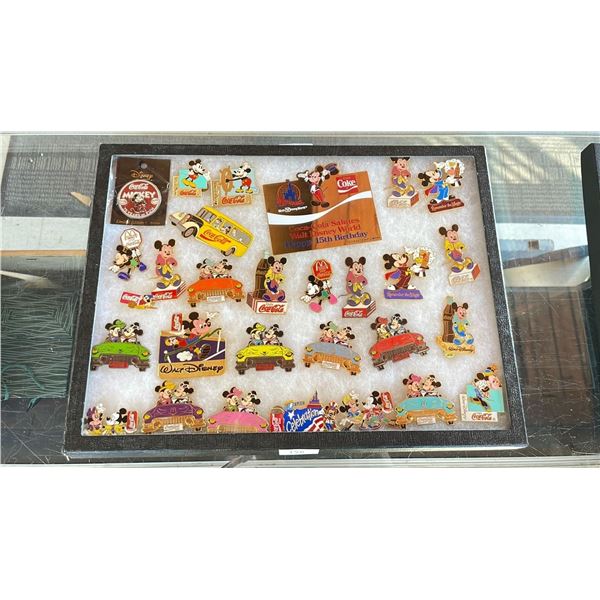 ASSORTED DISNEY PINS IN A CASE