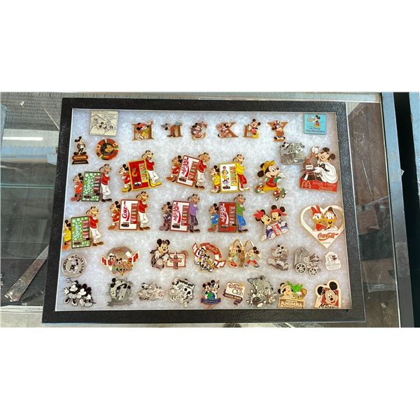 ASSORTED DISNEY PINS IN A CASE