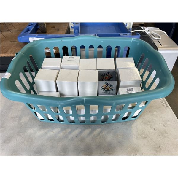 LAUNDRY BIN OF CANDLE HOLDERS