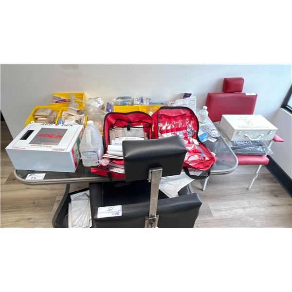 LARGE ASSORTMENT OF FIRST AID SUPPLIES AND (2) EXAM ROOM CHAIRS