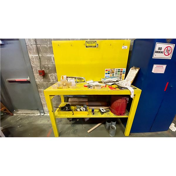 YELLOW WORK TABLE WITH METAL BACK BOARD 72"L X 60"W X 24 "H CONTENTS INCLUDED ROLLS OF TAPE AND