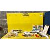 Image 2 : YELLOW WORK TABLE WITH METAL BACK BOARD 72"L X 60"W X 24 "H CONTENTS INCLUDED ROLLS OF TAPE AND