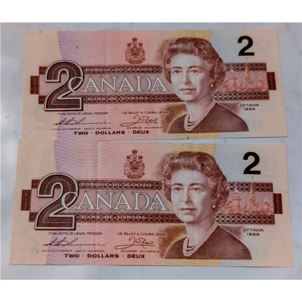 PAIR OF CONSECUTIVE 1986 CANADA $2 BANKNOTES
