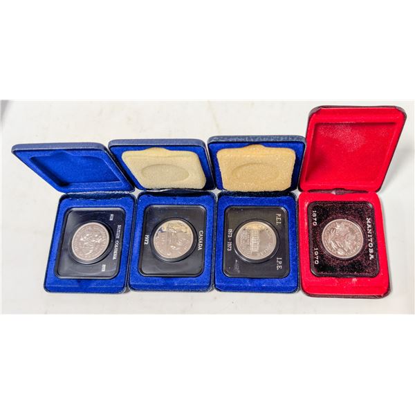 LOT OF 4 CANADA $1 COINS IN PRESENTATION CASES