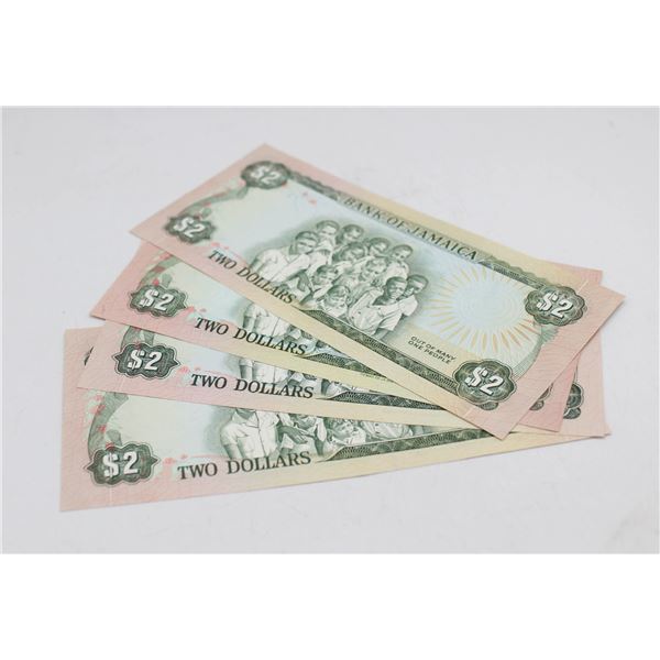 LOT OF 4 JAMAICA $2 BANKNOTES. UNCIRCULATED.
