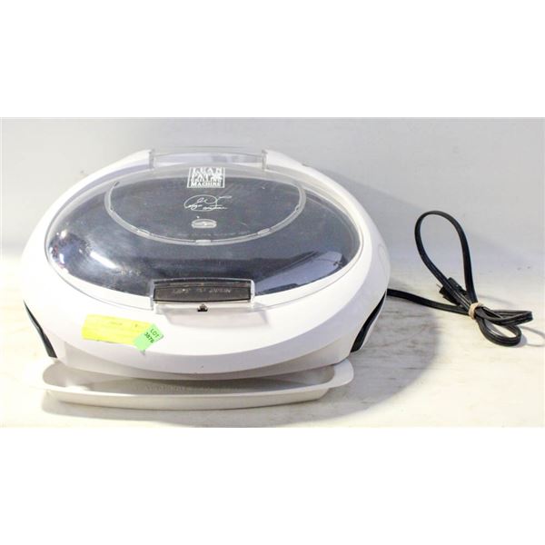 GEORGE FOREMAN LEAN GRILLING MACHINE