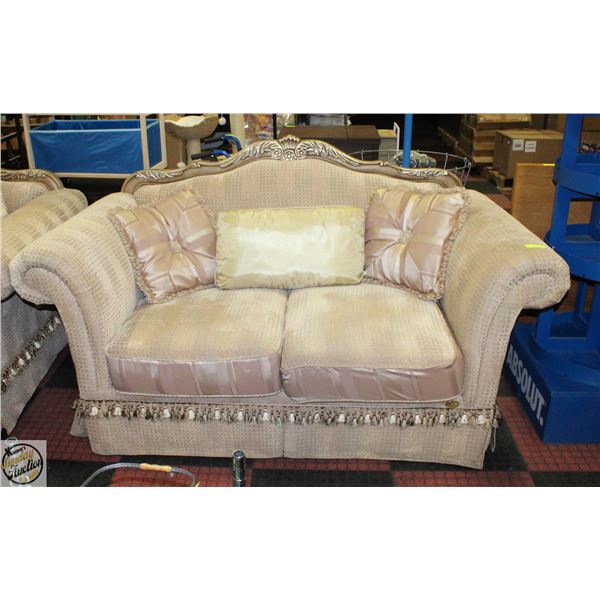 ESTATE DEEP SEAT LOVE SEAT WITH CARVED ACCENTS AND