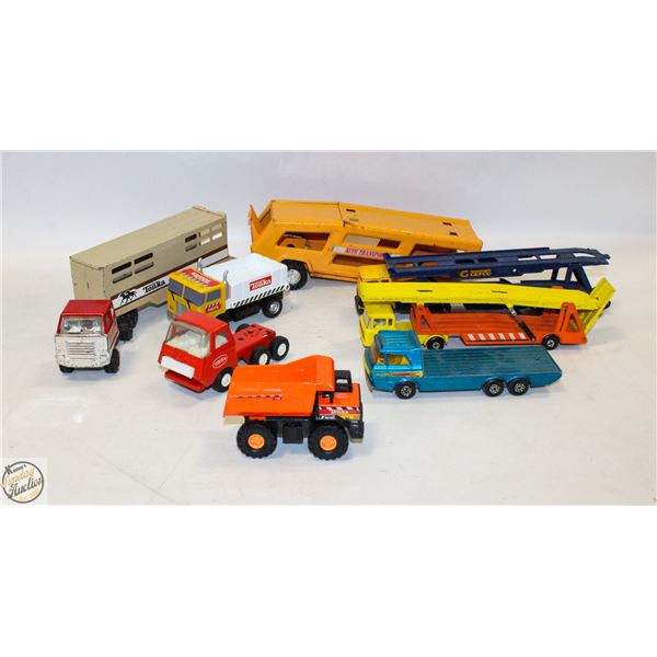 FLAT OF TONKA TRUCKS AND TRAILERS