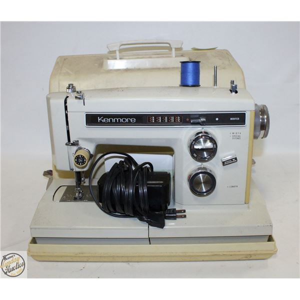 ONE SEWING MACHINE WITH CASE