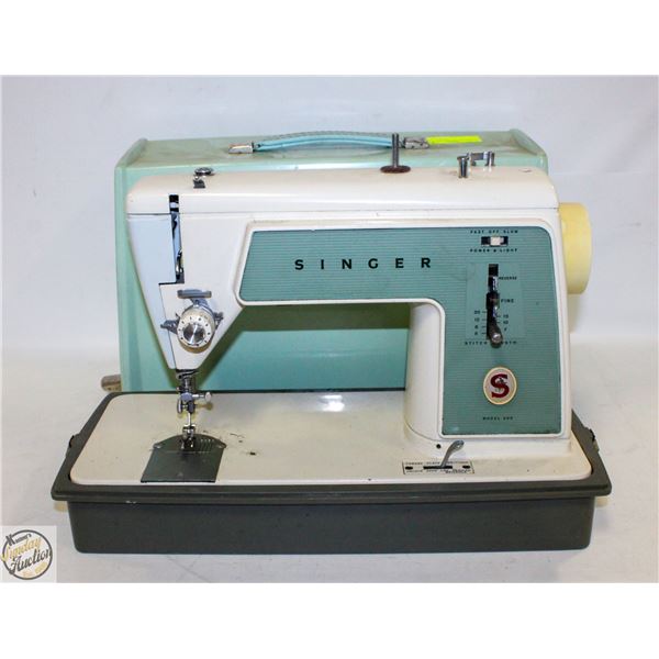 ONE SEWING MACHINE WITH CASE