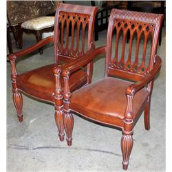 2 Brown Padded Chairs