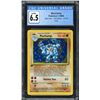 Image 1 : 1999 Pokémon Machamp 1st edition Holo - CGC 6.5