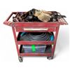 Image 1 : Red Rolling Tool Cart with Assorted Straps, Leather Pouch, and Coiled Hose