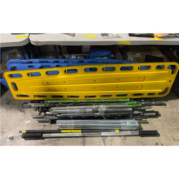 Yellow spine board with assorted weight metal poles
