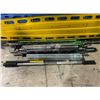 Image 2 : Yellow spine board with assorted weight metal poles