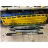 Image 3 : Yellow spine board with assorted weight metal poles
