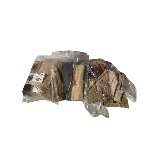 Set of tan towels, some with fake blood stains