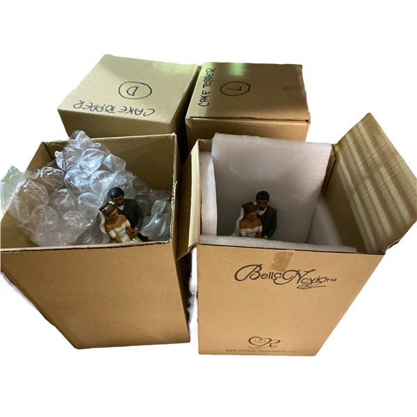 4 Cake Toppers In Boxes