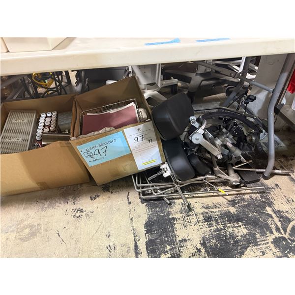 Contents under table - TV doctor show medical equipment props.