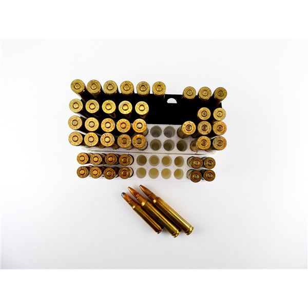 ASSORTED REMINGTON AMMO AND NON-PRIMED BRASS CASES LOT