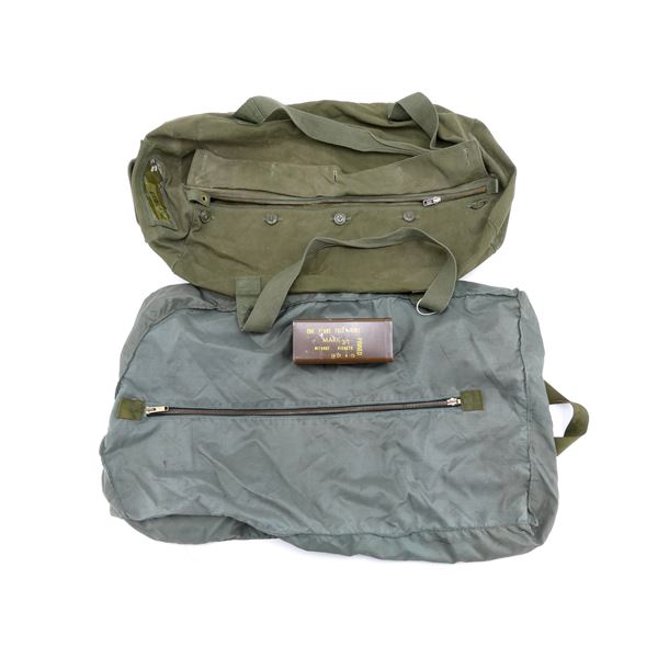 ASSORTED CANADIAN MILITARY DUFFEL BAG AND BRITISH MILITARY FLARE TIN LOT