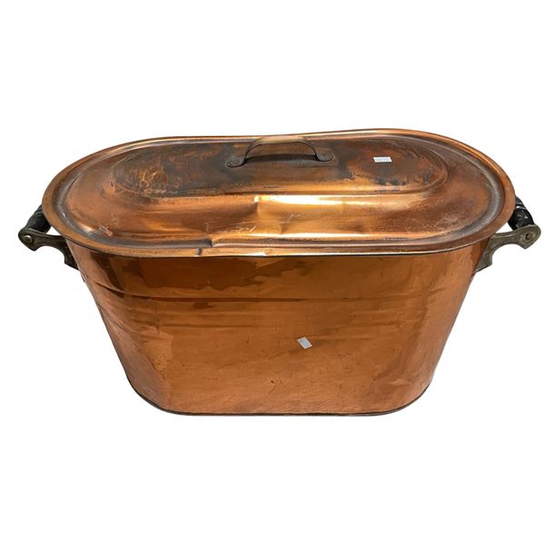 Large metal fireplace box containing fire starters