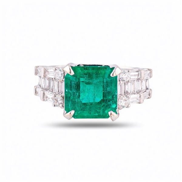4.40 ctw Emerald and 1.07 ctw Diamond 18K White Gold Ring (Minor Oil Treatment)