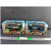 Image 1 : (2) Monster Charge Cross Country R/ C Trucks - New