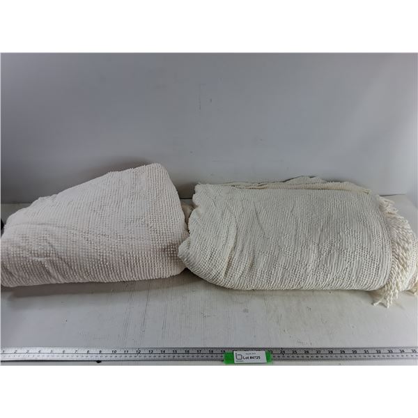 (2) 9.5′ Long Textured Blankets