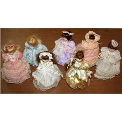 Lot--7 Porcelain Musical Dolls