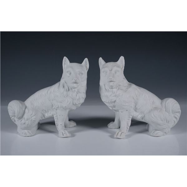 Pair of Bisque Porcelain Dog Figurines