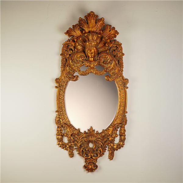 Monumental Giltwood Mirror With Crowned Figural Crest