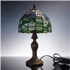 Image 1 : Tiffany-Style Stained Glass Table Lamp with Golfer Design