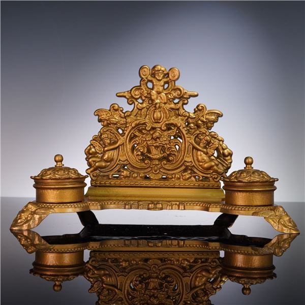 Gilded Cast Iron Double Inkwell with Ornate Backplate and Cherub Motif