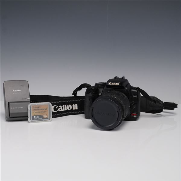 4pc Canon EOS Digital Rebel XTi Camera + Battery Charger and Memory Card