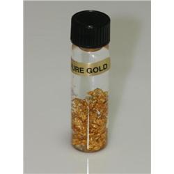 Small Bottle of Gold Flakes in Liquid