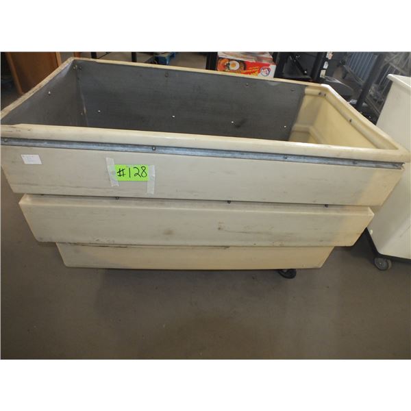 Two Plastic Storage Bins On Wheels