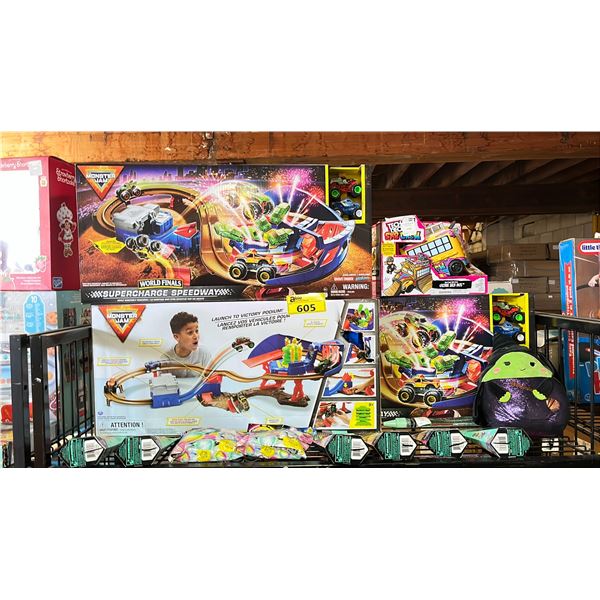 SHELF OF TOYS INCLUDING: MONSTER JAM SPEEDWAY, GLINDA SQUISHMALLOW, CRAYOLA BUBBLE WAND & MORE
