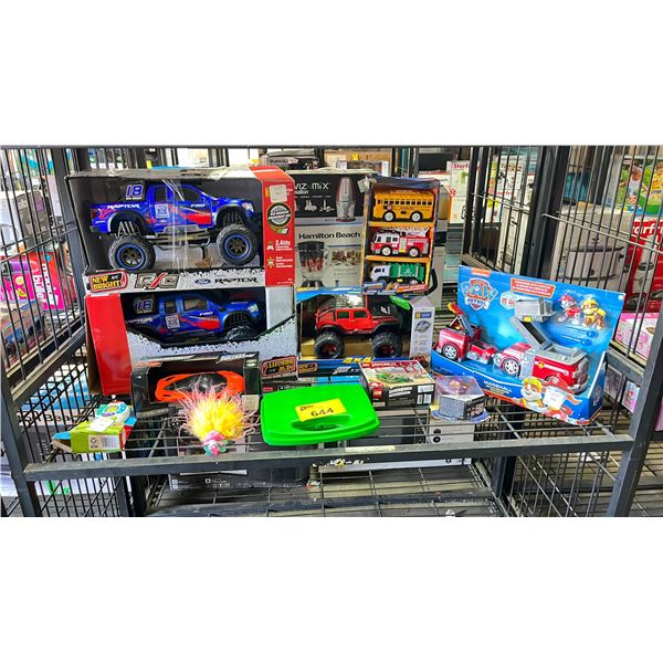 SHELF OF TOYS: (2) RC F150 TRUCKS, PAW PATROL FIRE TRUCK, LEGO NINJAJO STREET BIKE & MORE