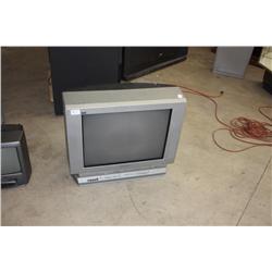 T.V. with attached VCR & DVD players