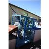 Image 1 : Wire Cage On Wheels With Plants & Large Fish