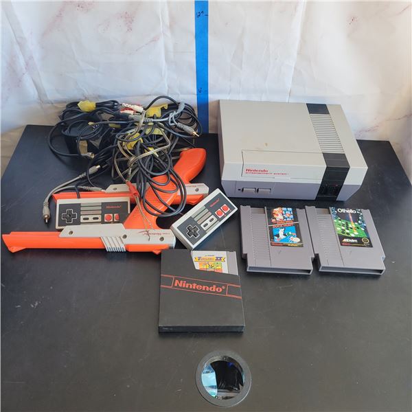 Original Nintendo NES with 2 Controllers, 2 Zappers, Cords and 3 Games