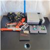 Image 1 : Original Nintendo NES with 2 Controllers, 2 Zappers, Cords and 3 Games