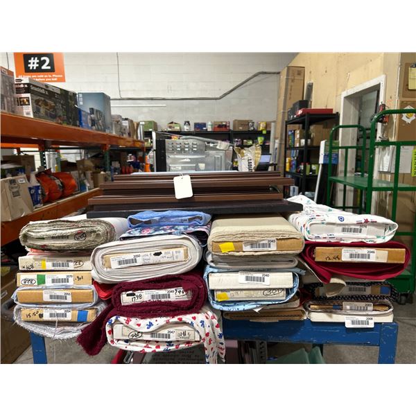 Bulk Lot of Assorted Fabric Bolts and Framed Photos