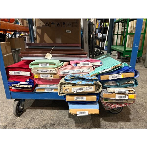 Fabric Bolts and Framed Items on Cart